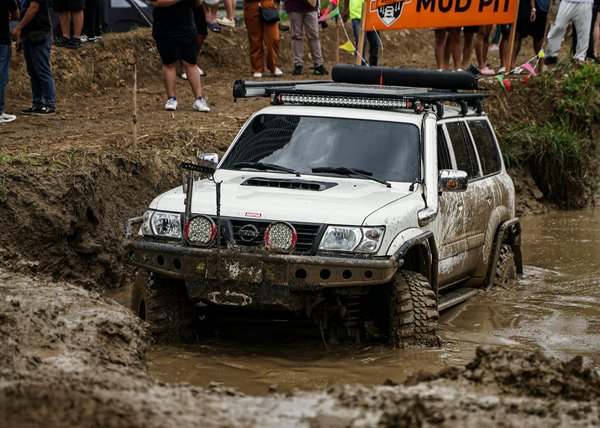 What are the effects of weather on motorcycle riding, and how should you prepare?