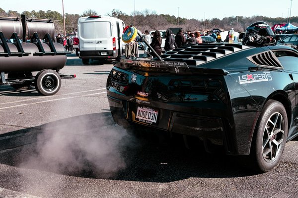 How do carpooling and ride-sharing services impact vehicle ownership trends in the UK?